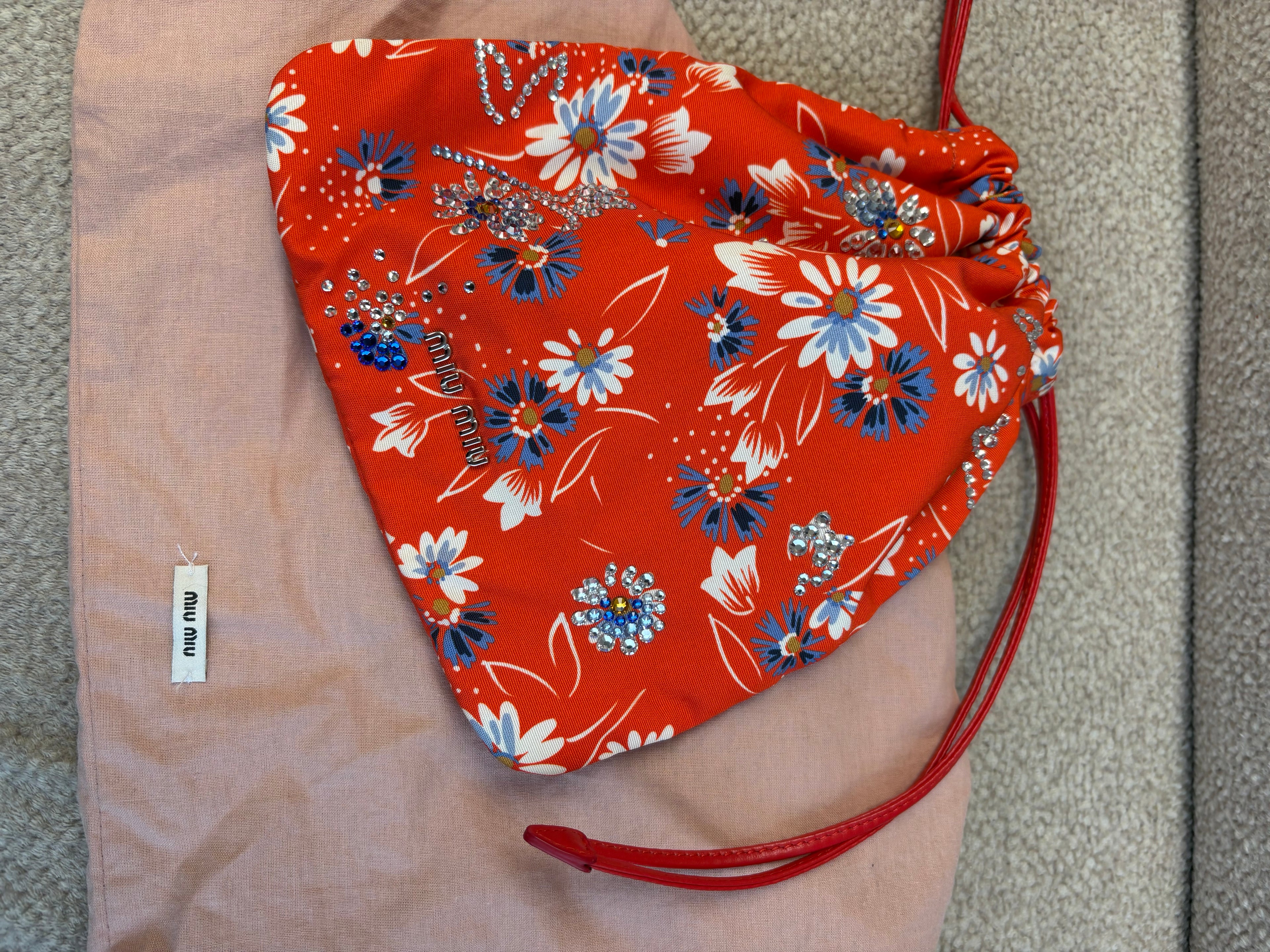 Miu Miu crystal-embellished floral print drawstring pouch