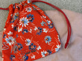 Miu Miu crystal-embellished floral print drawstring pouch